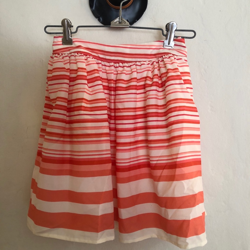 Orange stripped mini skirt